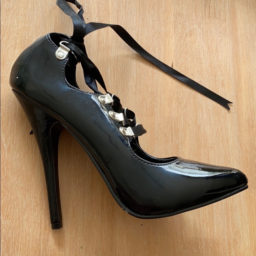Stiletto heels worn in a fetish photo shoot.